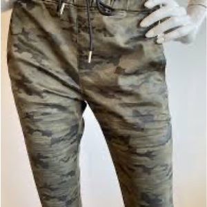 Bevy Flog woman’s pants Sz 29. Green camo slightly faded